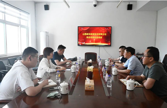 郑州银行调研组在圆梦钱包集团参观调查
